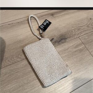 The Sak Cream Wristlet